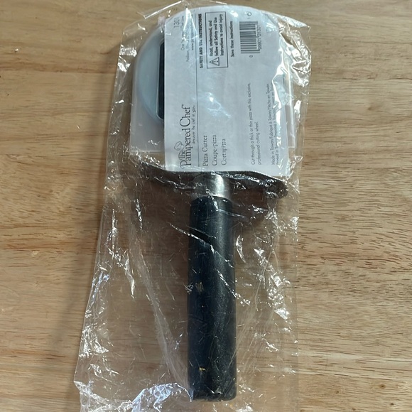 Pampered Chef Other - New Pampered Chef pizza cutter still in original packaging.